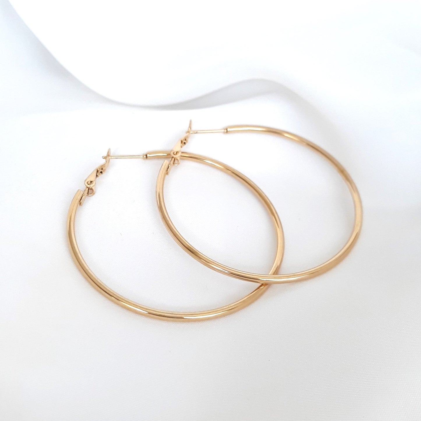 Boucles d'oreilles dorées Bermudienne