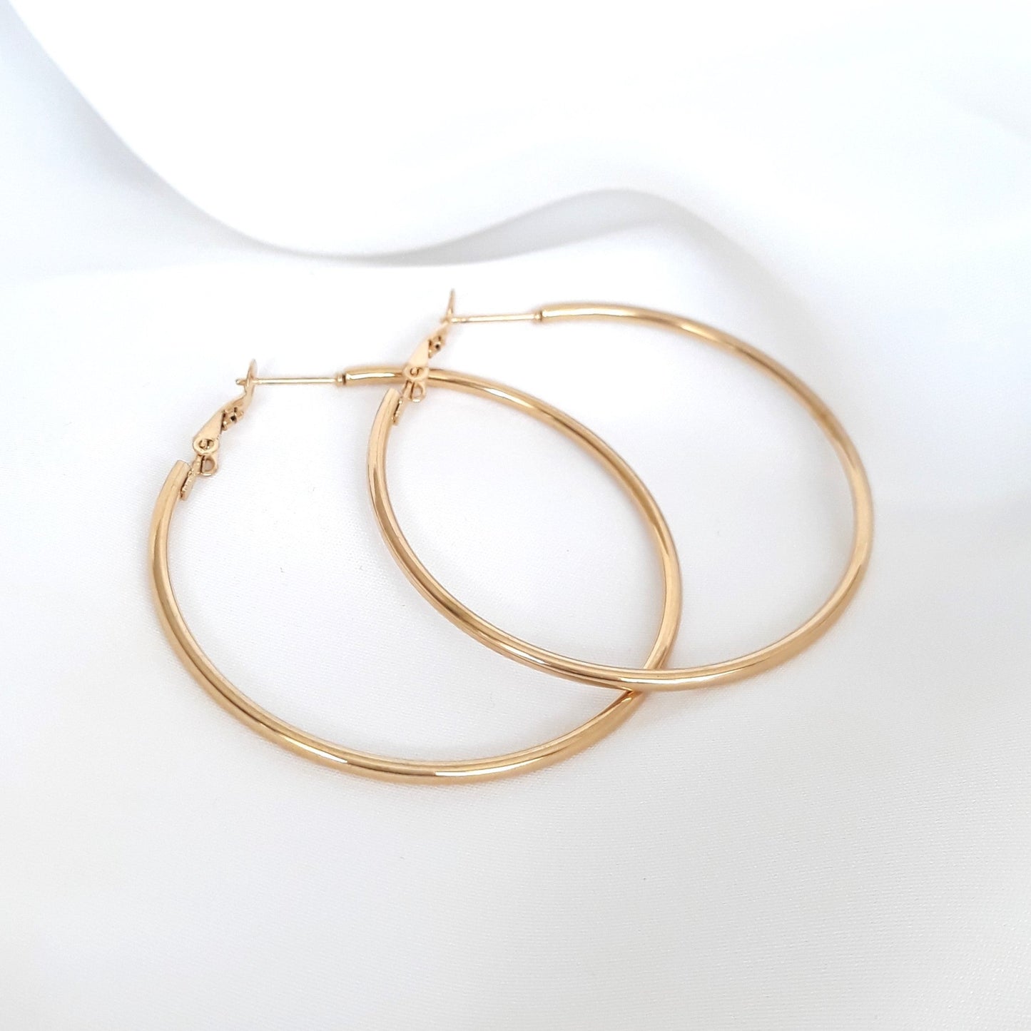 Boucles d'oreilles dorées Bermudienne